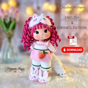 May include: Crochet pattern for a pink and white doll wearing a bunny sleep mask and pajamas. The pattern is available in English and Spanish in PDF format. Download the pattern today.