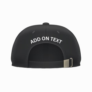 May include: Black baseball cap with a white adjustable strap and a white embroidered text that says "ADD ON TEXT" on the back.