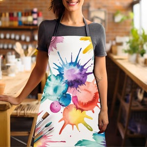 絵筆付き画家用エプロン。絵の具が飛び散るカラフルなアーティスト用エプロン。画家や美術教師へのギフト。アートスタジオ用のカラフルなエプロン。