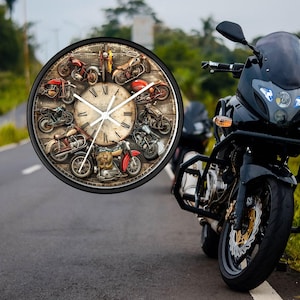 May include: A round wall clock with a black frame featuring a vintage motorcycle design. The clock face has Roman numerals and a distressed, aged appearance. Various motorcycle models are arranged around the clock face.