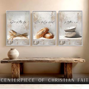 May include: A triptych of framed art prints featuring wheat, bread, and bowls, with scriptural text. A rustic wooden bench and a decorative vase are in the foreground. The text at the bottom reads "A Centerpiece of Christian Faith."