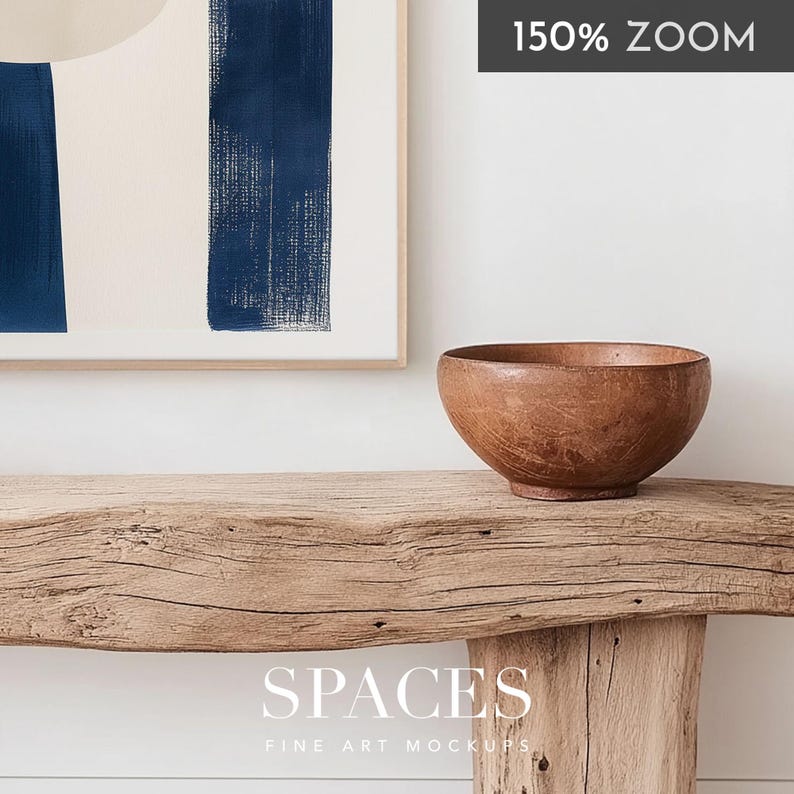 Puede incluir: Un cuenco de madera sobre una mesa de madera r&uacute;stica con una pintura abstracta enmarcada con rayas azules y blancas de fondo. El texto "SPACES FINE ART MOCKUPS" es visible en la parte inferior de la imagen.