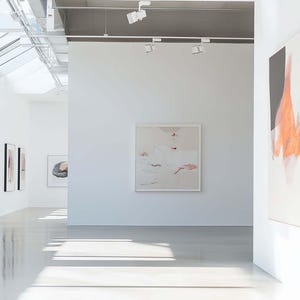 May include: A bright, modern art gallery with white walls and polished floors. Several framed abstract paintings are displayed, with a focus on neutral tones and soft colors. The space is well-lit with natural and artificial light.