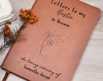 May include: Brown leather journal with the text "Letters to my Bestie in Heaven" and "In loving memory of Samantha Joseph" engraved on the front cover. The journal features a dandelion design.