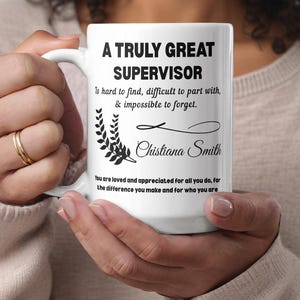 May include: White ceramic mug with the text "A TRULY GREAT SUPERVISOR" in black. The mug includes a personalized name and a message of appreciation. A perfect gift for a supervisor.