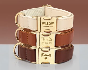 May include: Three dog collars stacked on top of each other. The top collar is cream coloured with gold hardware and the name "Willow" and address "123 Park Lane" engraved on the buckle. The middle collar is brown with gold hardware and the name "Charlie" and phone number "214-555-7647" engraved on the buckle. The bottom collar is dark brown with gold hardware and the name "Daisy" and a heart engraved on the buckle.