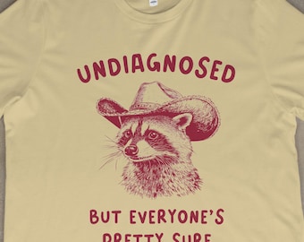 Funny Raccoon Cowboy T-Shirt, Undiagnosed But Pretty Sure Shirt, Quirky Western Graphic Tee, Retro Animal Lover Gift, Cowboy Humor Shirt