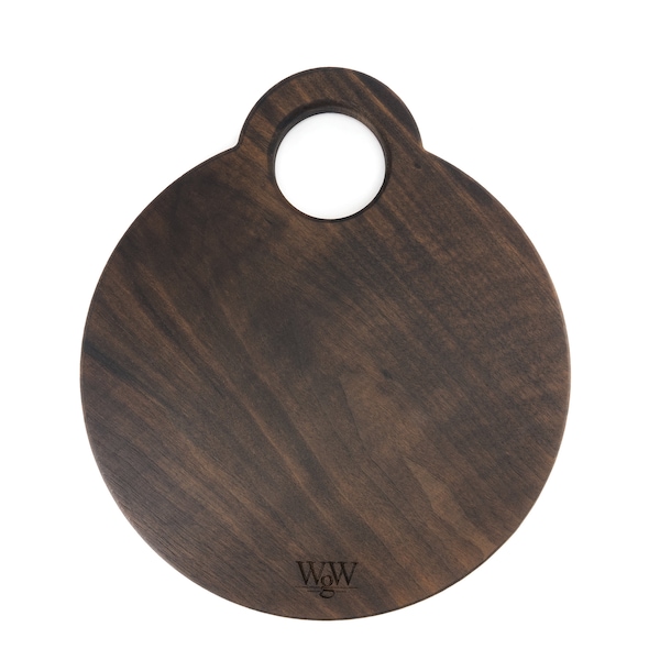 RUND SKÄRBRÄDA. 13" Solid walnut round board. Simple elegance - form meets function. Charcuterie, graze, cutting, presentation, does it all.