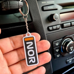 Llavero personalizado de McLaren F1, Lando Norris, Oscar Piastri, regalo / llavero con código de piloto personalizado: regalo de cumpleaños para un fan de la Fórmula 1.