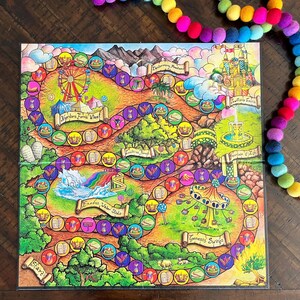 May include: A colorful board game with a winding path, featuring images of a Ferris wheel, a rainbow, and a swing set. The game board is divided into four sections, each with a different theme. The game board is made of cardboard and has a glossy finish.