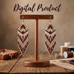 May include: A pair of long, diamond-shaped beaded earrings featuring a geometric pattern in shades of cream, tan, and dark brown, hanging from a wooden T-bar display stand. The text Digital Product is visible at the top of the image.