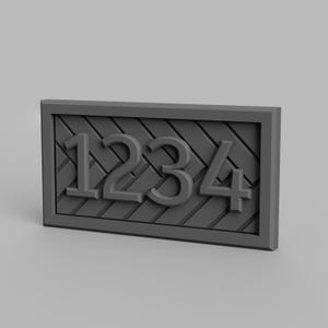May include: A gray house number plaque with a diagonal wood grain pattern and the numbers 1234 embossed on the front.