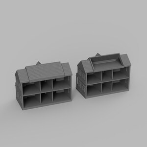 May include: Two gray miniature house models with multiple open compartments. Each model has a pitched roof with a textured shingle pattern and small windows. The houses are designed with a simple, geometric aesthetic.