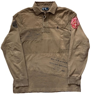 May include: A white ceramic mug with a black handle and the text "But first, coffee" in a black, handwritten-style font. The mug is on a white surface.