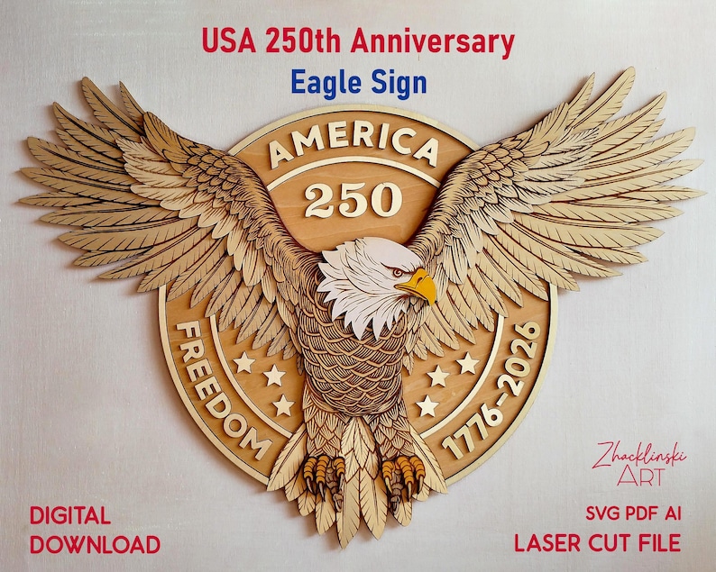 A wooden laser-cut eagle sign with the text "USA 250th Anniversary Eagle Sign". The eagle has outstretched wings and is centered on a circular emblem with the words "AMERICA 250" and "FREEDOM 1776-2026".