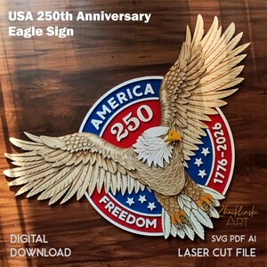 A wooden eagle sign with outstretched wings, featuring the text "AMERICA 250 FREEDOM 1776-2026". The sign is a laser cut file, with the words "USA 250th Anniversary Eagle Sign" and "DIGITAL DOWNLOAD" visible.