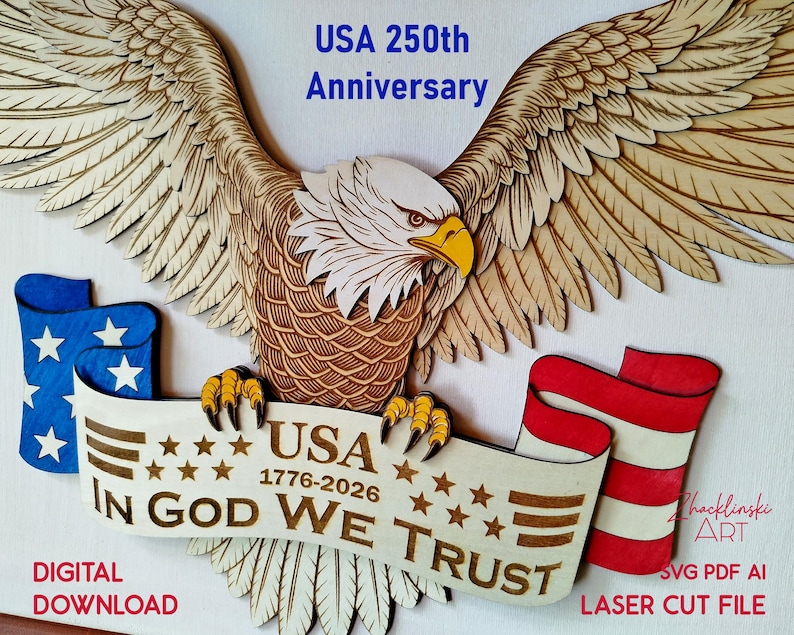 May include: A wooden laser-cut design featuring an American bald eagle with outstretched wings. The eagle holds a banner with the text "USA 1776-2026 IN GOD WE TRUST." The design includes blue and red flag elements, with the text "USA 250th Anniversary."