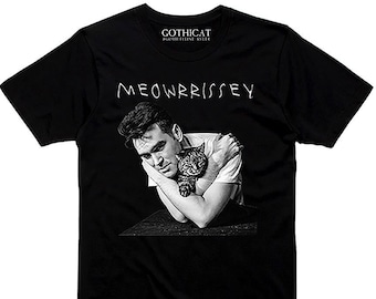 May include: Black t-shirt featuring a black and white graphic of a person holding a cat, with the text "MEOWRRISSEY" in white. The shirt also has the text "GOTHICAT" at the top. The t-shirt is a crew neck style.