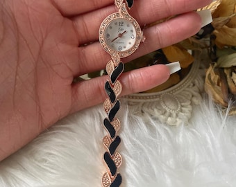 Black and rose gold watch