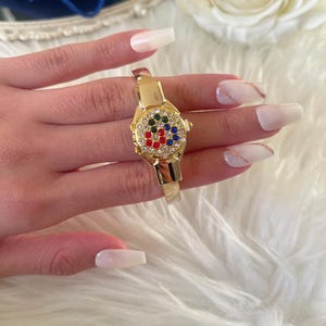 Dainty peek-a-boo watch