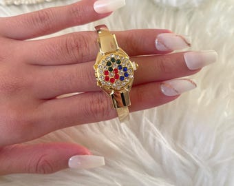 Dainty peek-a-boo watch