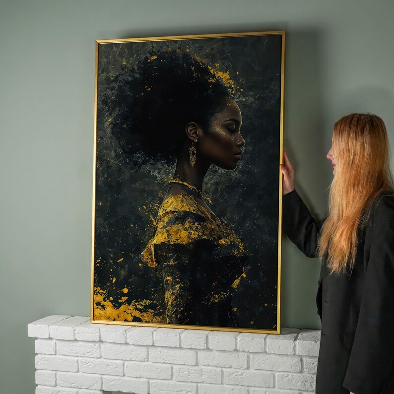 a living room with a white couch and a painting on the wall