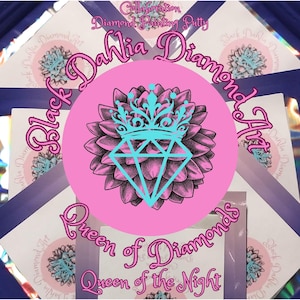 May include: A collection of diamond painting putty products. The central design features a pink circle with a flower, a teal crown, and a diamond. Text includes "Black Dahlia Diamond Art" and "Queen of Diamonds".