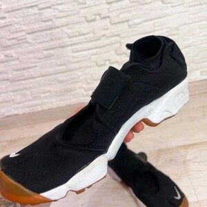 May include: A set of three ceramic mugs with a speckled, matte finish. The mugs are in shades of cream, light gray, and dark gray. Each mug has a simple, minimalist design, perfect for coffee or tea.