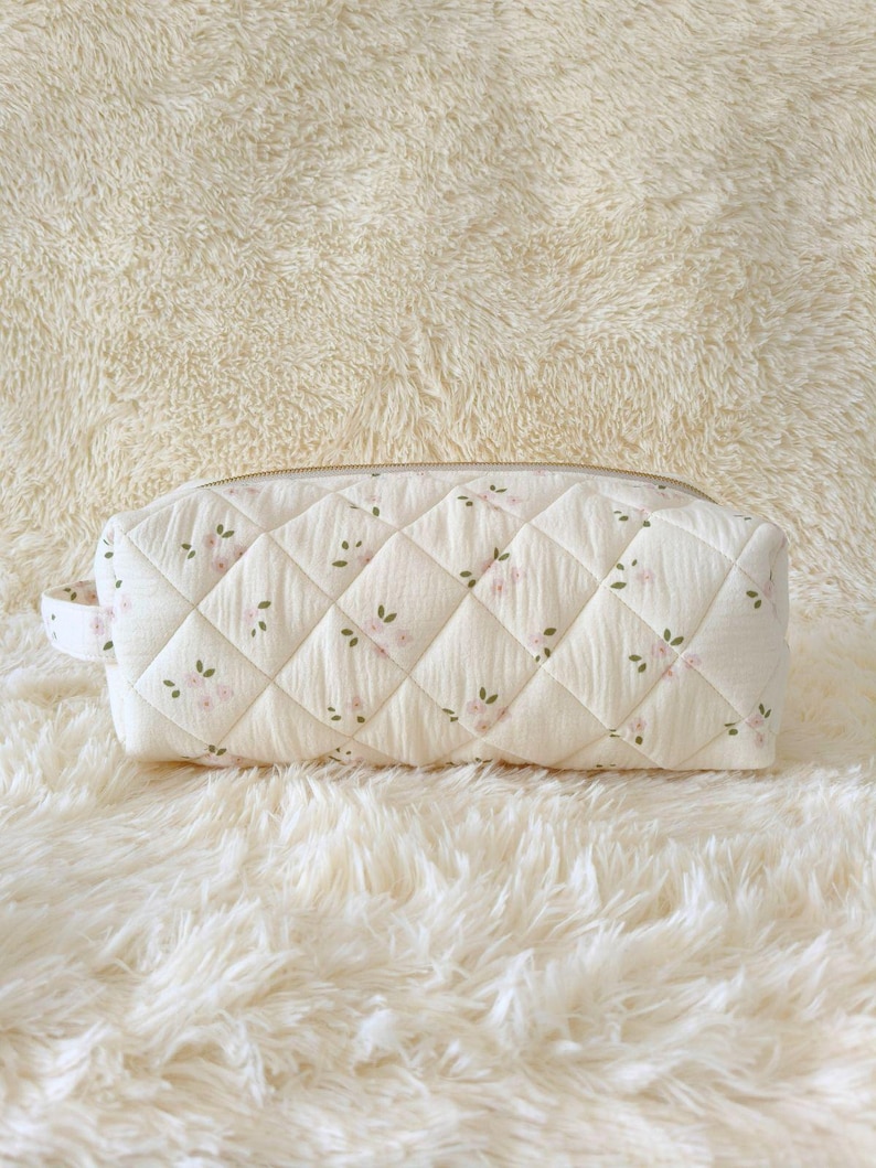 Pink flower on white coquette padded quilted toiletry bag case pouch organizer holder for Dyson Airwrap, Dyson Airstrait, Shark Flexstyle, Shark SmoothStyle, Shark FlexFusion, T3 Aire 360 hair styling tools, 4 interior divider compartment pockets for attachments and accessories, large travel makeup bag, cosmetic case, curling iron storage, hair dryer bag for women, gift for her, vanity organizer, carry-on travel essential