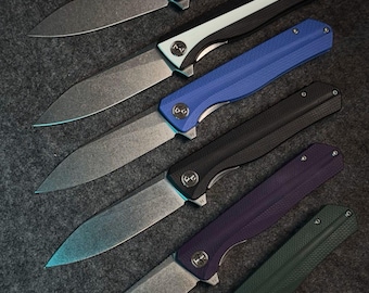 Coltello pieghevole EDC Petrified Fish PF818 con lama nera in acciaio D2, manico in G10 e blocco liner lock. Coltello tascabile, strumento multiuso per attività all'aperto.