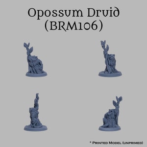 May include: A gray 3D printed miniature of an Opossum Druid holding a branch with leaves. The miniature is on a round base and is unpainted. The text "Opossum Druid (BRM106)" is printed above the miniature. The text "* PRINTED MODEL (UNPRIMED)" is printed below the miniature.