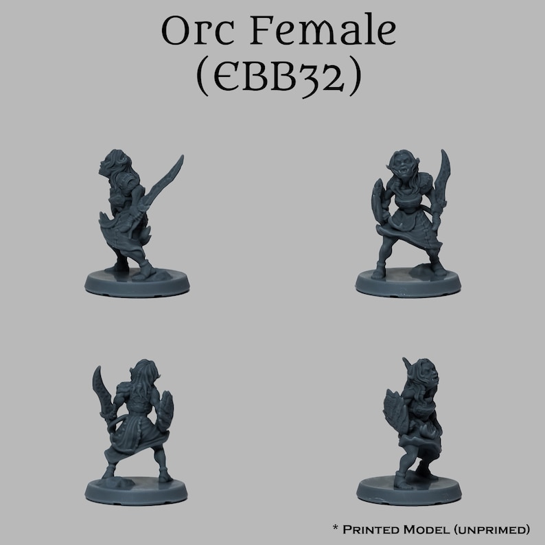 May include: Gray plastic miniature figurine of an Orc female warrior holding a sword and shield. The figurine is standing on a round base. The text "Orc Female (EBB32)" is printed on a white background above the figurine.