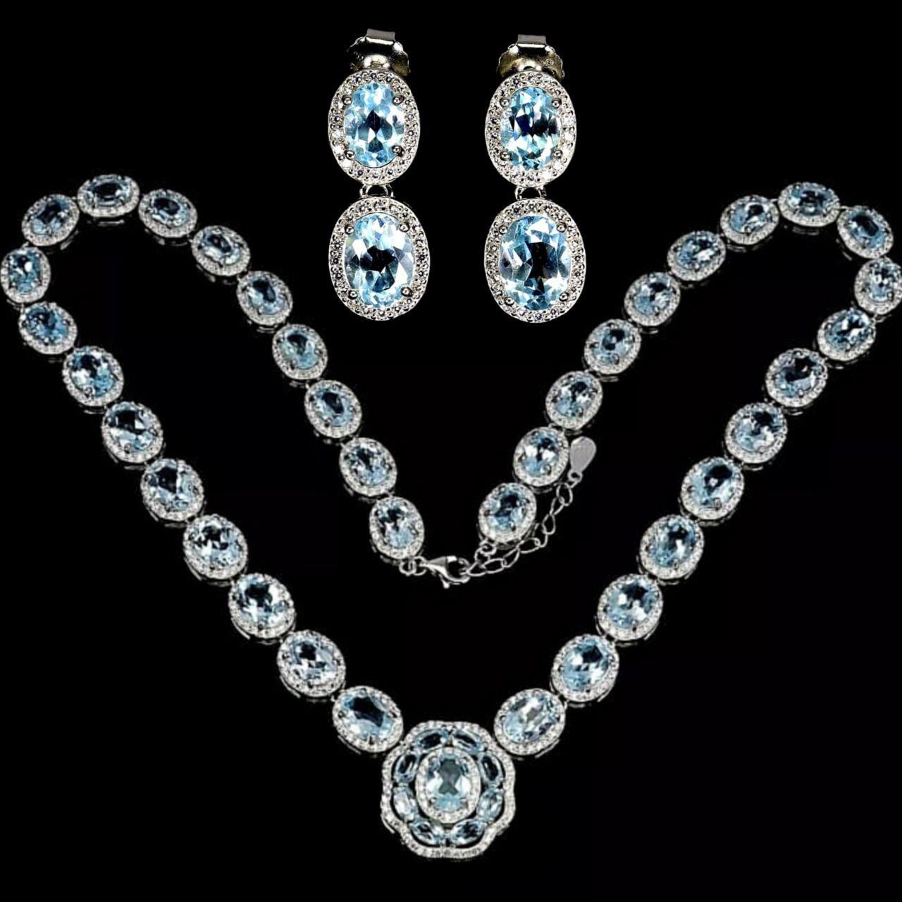 Exclusive exquisite silver set with natural blue topaz "Heavenly Radiance"