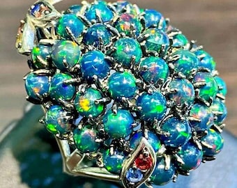An extremely beautiful exclusive silver ring with a natural opal &quot;Eridanus — the brightest constellation&quot;