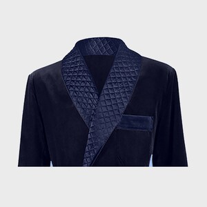 May include: A navy blue robe with a quilted collar and a velvet pocket.