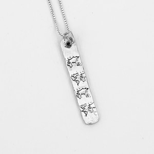 Collier carte du monde en argent