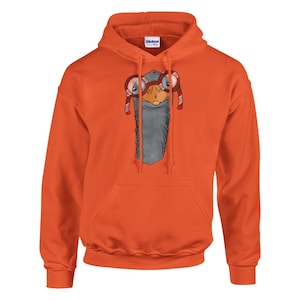 May include: Orange hooded sweatshirt with a cartoon illustration of an ostrich wearing red glasses.