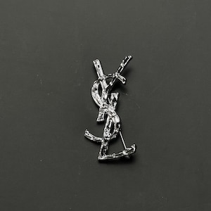 Vintage Yves Saint Laurent Silver Metal Brooch