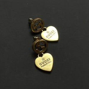 Impresionantes pendientes vintage Gucci en tono dorado