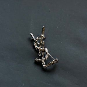 Wonderful Vintage Yves Saint Laurent Silver Brooch