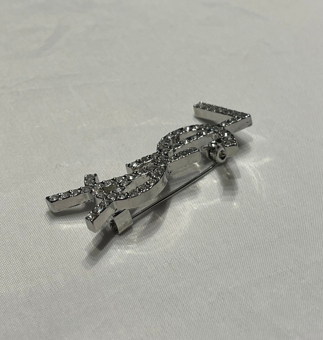 Vintage Yves Saint Laurent Silver Metal Brooch With Stones Vintage Yves Saint Laurent Silver Metal Brooch With Stones