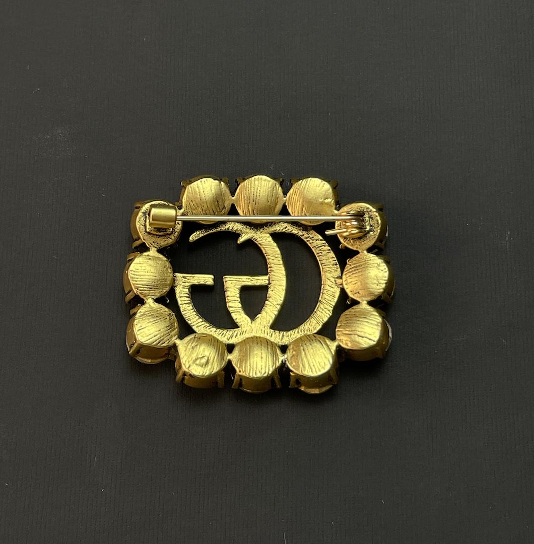 Gucci GG crystal brooch - ShopStyle Pins
