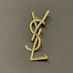 Vintage Yves Saint Laurent Silver Metal Brooch With Stones Vintage Yves Saint Laurent Silver Metal Brooch With Stones