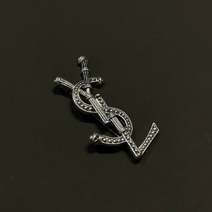 Vintage Yves Saint Laurent Silver Metal Brooch