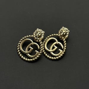 Impresionantes pendientes vintage Gucci en tono dorado