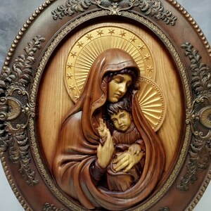 Icon of Mary with baby Jesus, the icon is made of wood, Christian icons, picture, bas-relief, religion, the best gift
