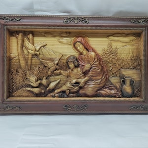 Icon of the Virgin Mary with baby Jesus, the icon is made of wood, Christian icons, picture, bas-relief, religion, the best gift