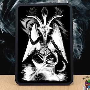 May include: Black and white image of a goat-headed figure with wings and a pentagram on its forehead. The figure is sitting on a throne with a crescent moon behind it. The text "ELIPHAS LEVI DEL" is at the bottom of the image.