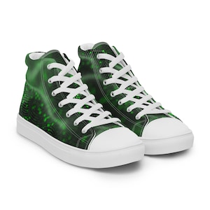 May include: High-top canvas sneakers with a green and black digital pattern. The shoes have white laces, a white toe cap, and a white sole. The sneakers are designed for casual wear.