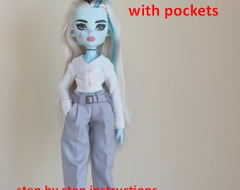 May include: A doll wearing a white button-down shirt and gray trousers with pockets. The doll has long, light-colored hair with blue streaks and is wearing white platform shoes. Text on the image reads "Pattern of trousers with pockets" and "step by step instructions."